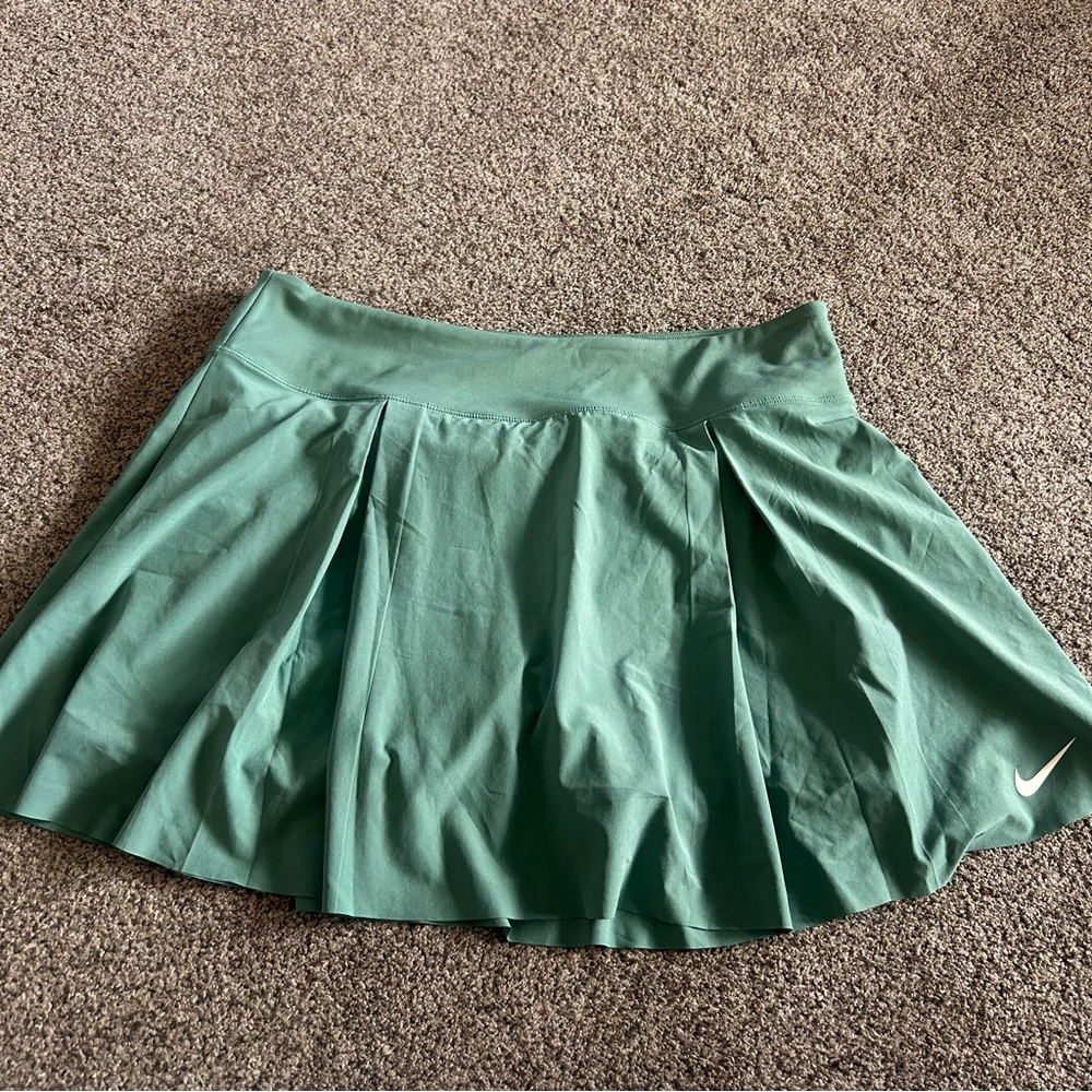 Green Nike Dri-FIT athletic skirt
